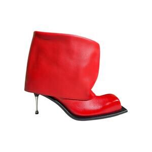 $945 Iman stiletto boot